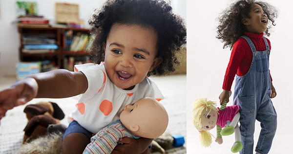African American girls playing with white dolls